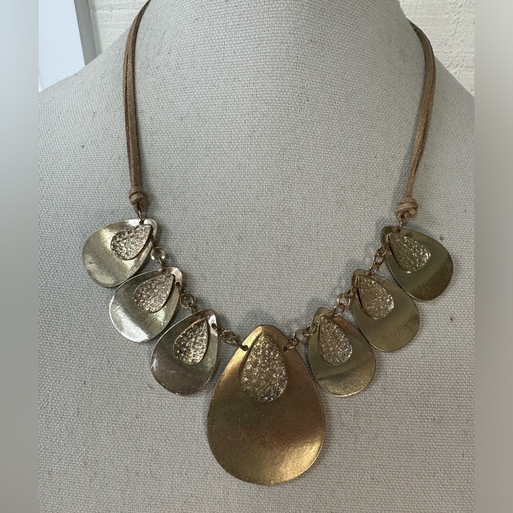 Industrial meets minimalist style drop goldtone dangle necklace
